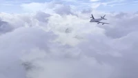 Narrow-body aircraft soaring through fluffy clouds in a blue sky.