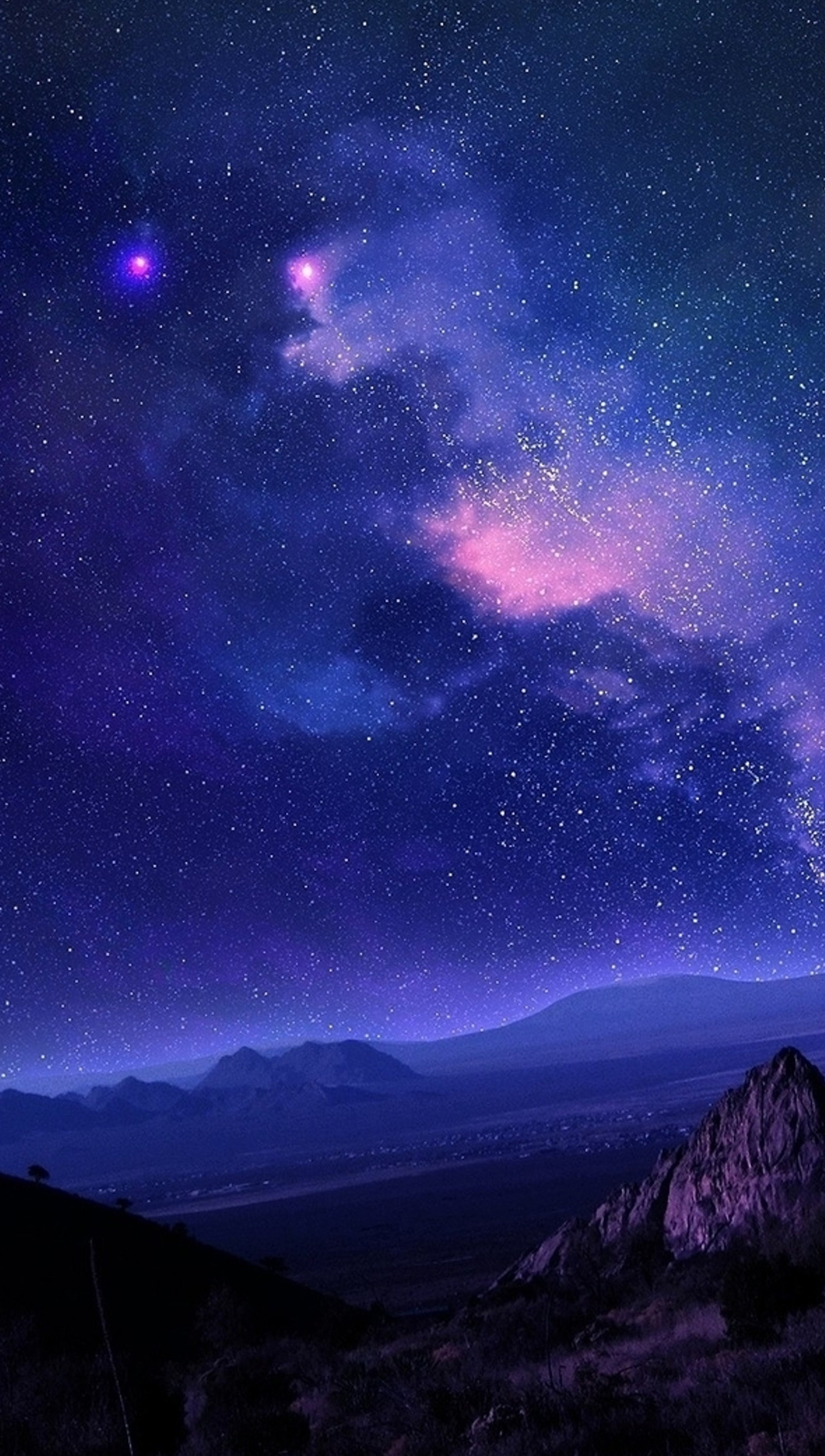 Starry night sky with a purple and blue star filled sky (burning, planet, sky, stars)