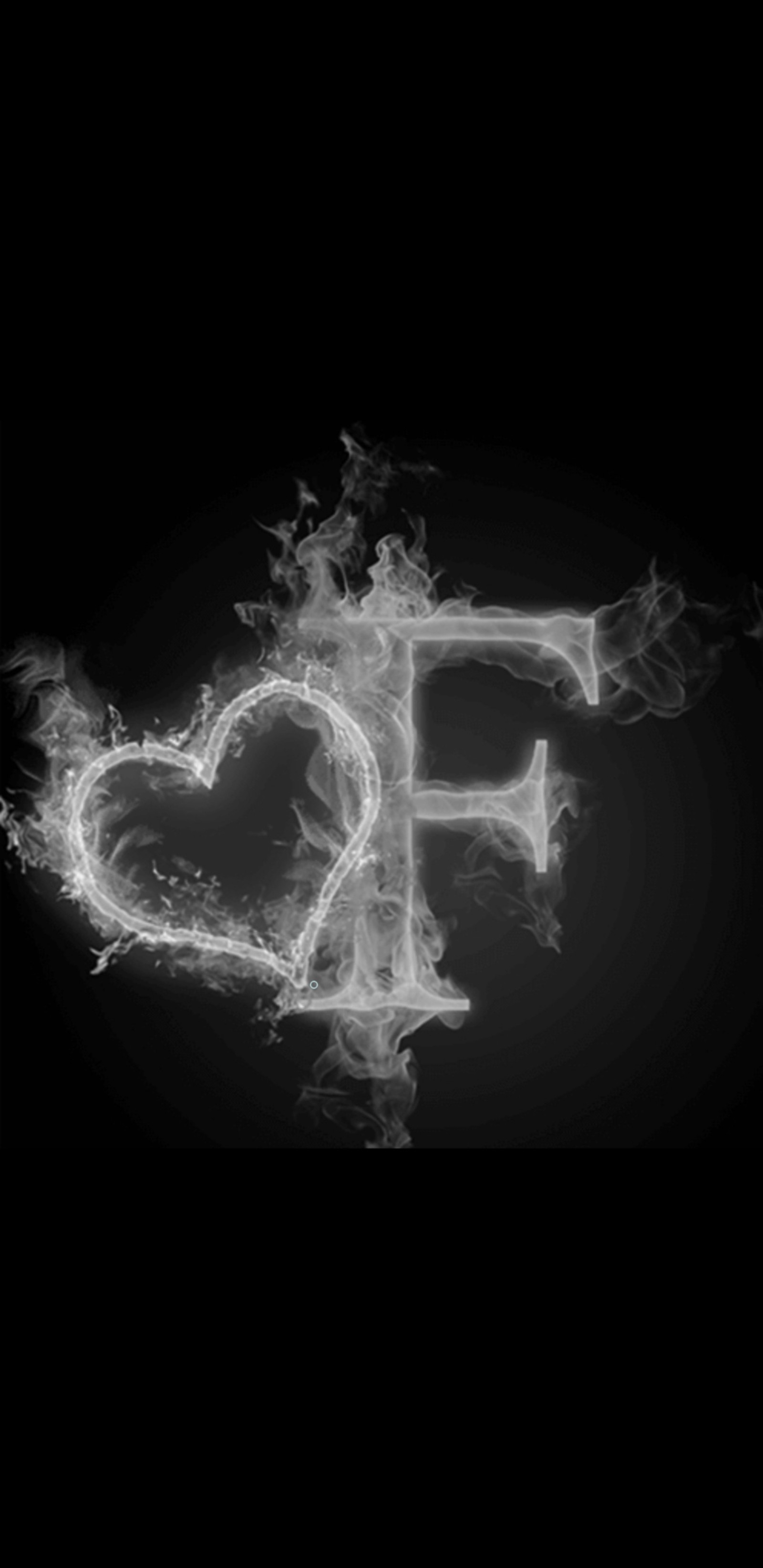 A black and white photo of a heart made of fire (smoke, black, alphabets, letter)