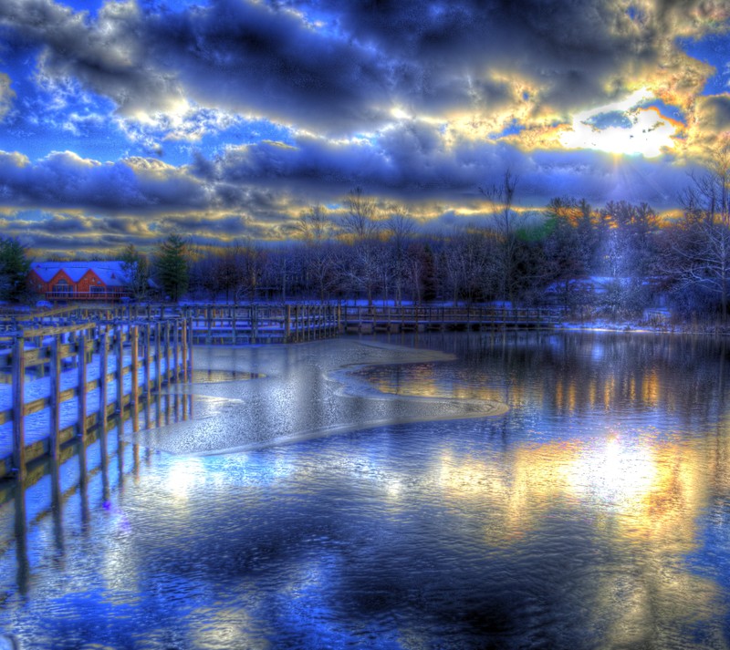 Arafed view of a lake with a bridge and a barn in the background (blue, hd, nature)