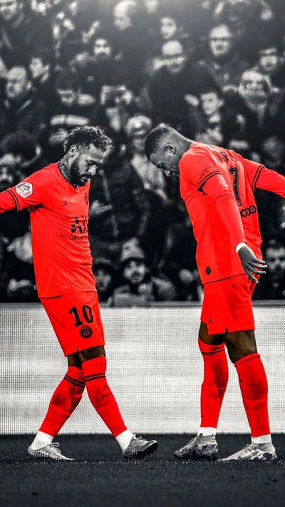 Neymar and Mbappé Celebrate in PSG's Bold Orange Kit