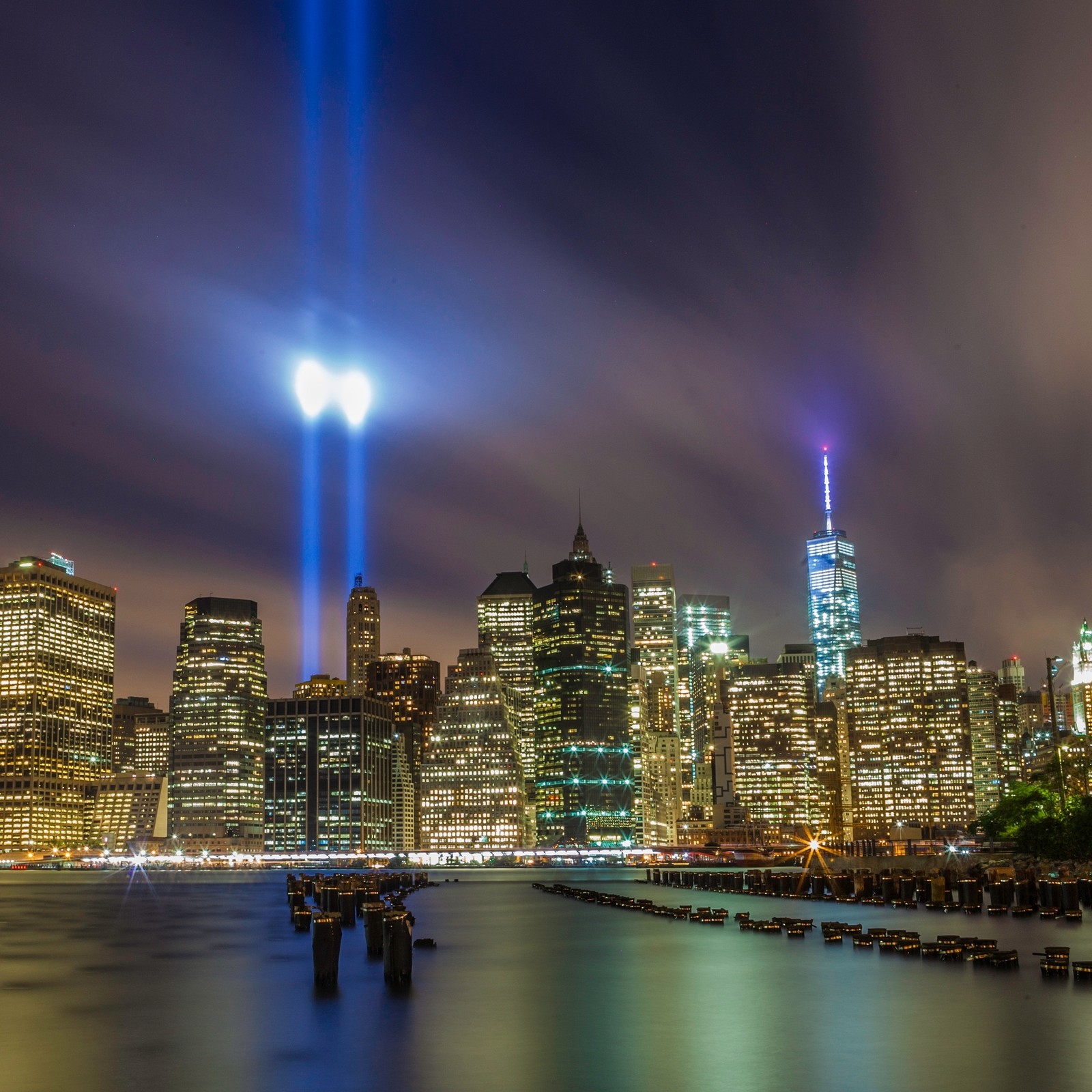 Arafective image of a city skyline at night with lights (911, city, freedom tower, new york, nyc)