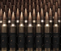 Rows of bullets with copper tips arranged in a uniform pattern.