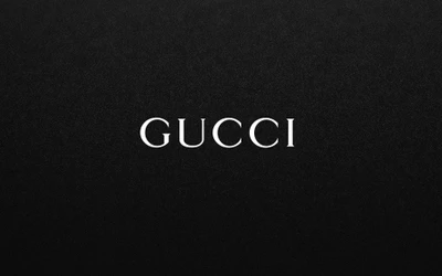 Elegant black background featuring the iconic white text "GUCCI" in a sophisticated font.