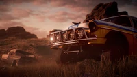 Carros de rally vintage navegando por uma paisagem acidentada ao pôr do sol em um cenário de videogame de corrida.