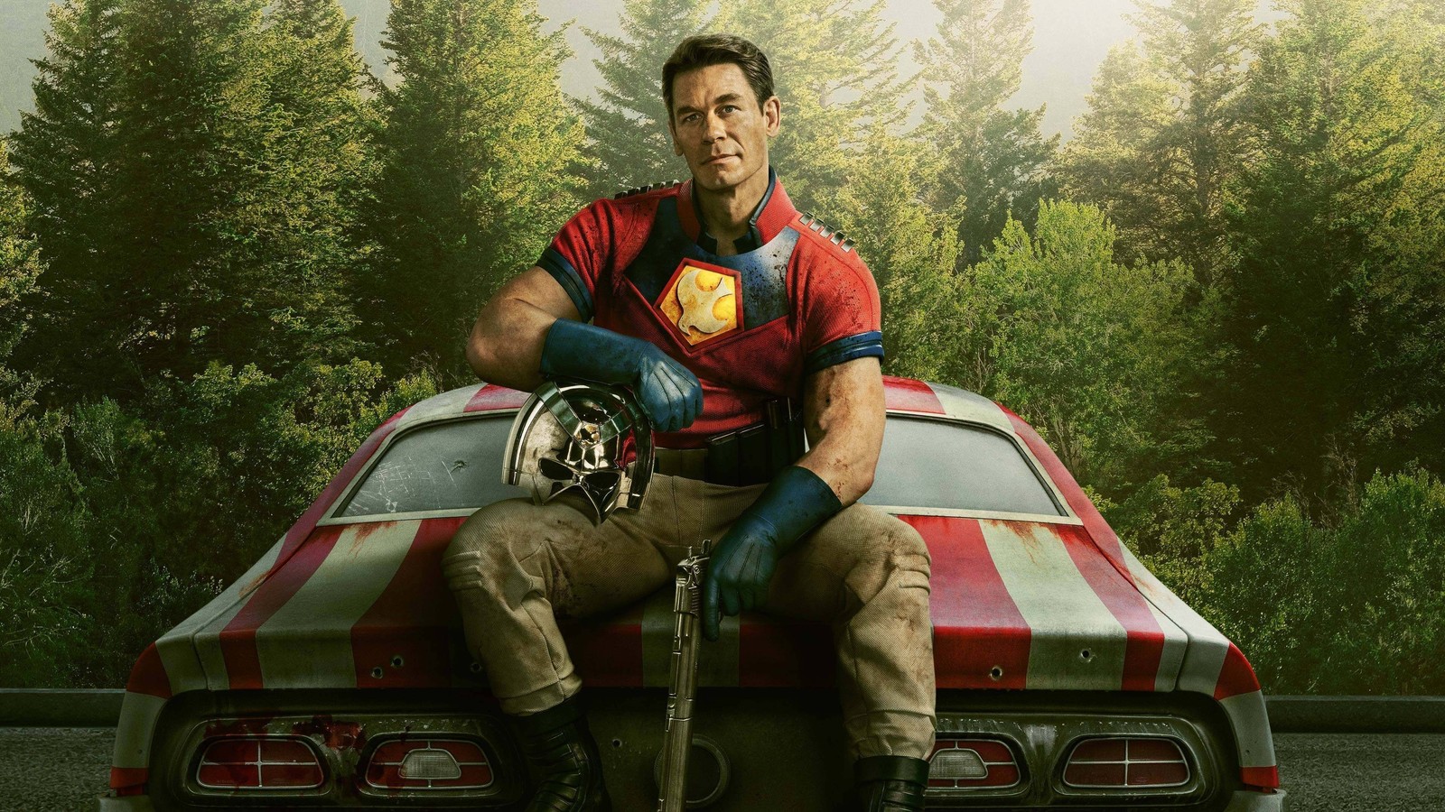 Un homme assis sur le toit d'une voiture avec une batte de baseball (pacificateur, john cena, série 2022, dc comics, super héros dc)