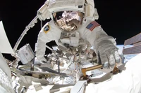 Astronaut Conducting a Spacewalk Outside the International Space Station