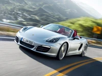 Porsche 718 Boxster: Dynamic Convertible Sports Car in Motion