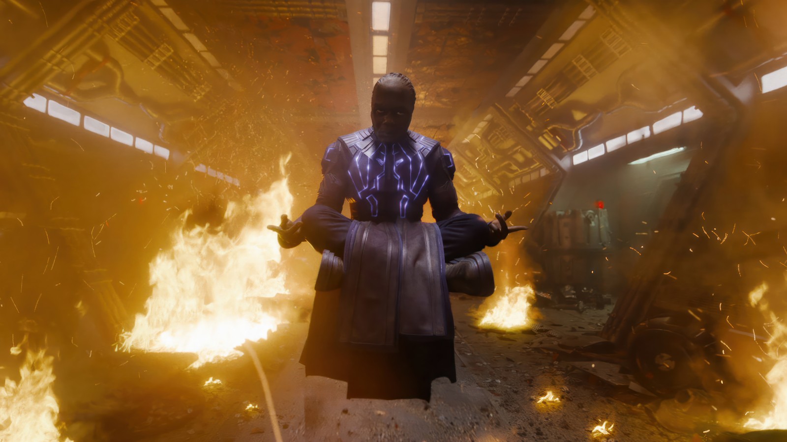 A man in a black coat and a purple cape standing in a room with flames (high evolutionary, guardians of the galaxy vol 3, movie, 2023, gotg 3)