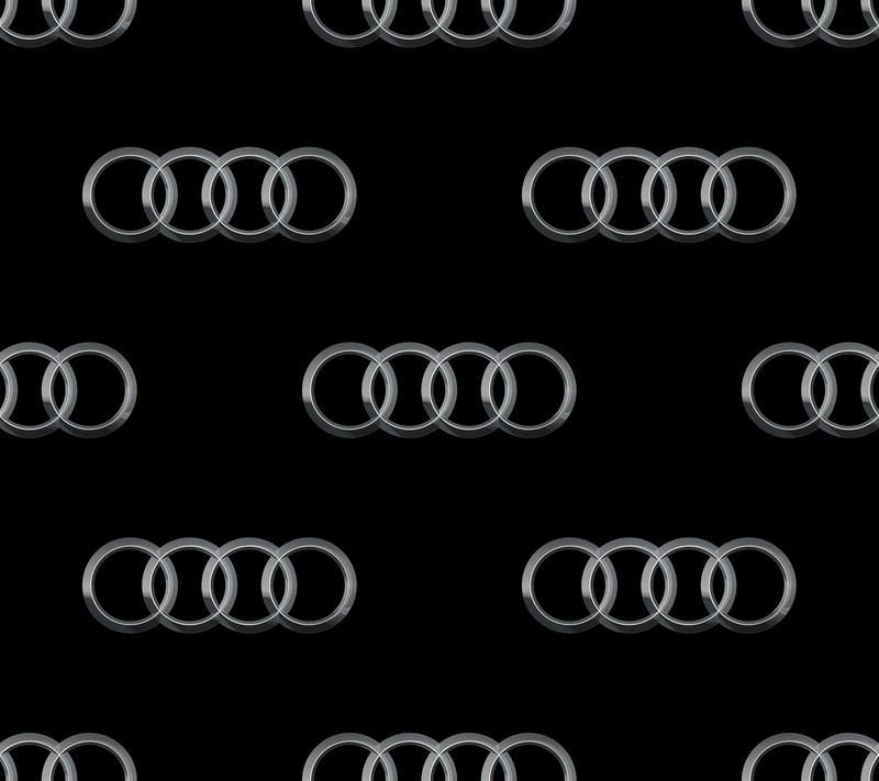 Ein schwarz-weiß-bild einer gruppe von drei audis (audi, auto, logo)