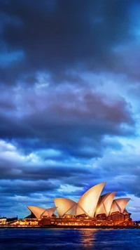 Sydney Opera House Illuminated Against a Dramatic Sky