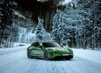 2022 Porsche Taycan Turbo S Sport Turismo in Vibrant Green on a Snowy Winter Road