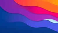 Vibrant Waves of Orange, Pink, and Purple on a Gradient Slope