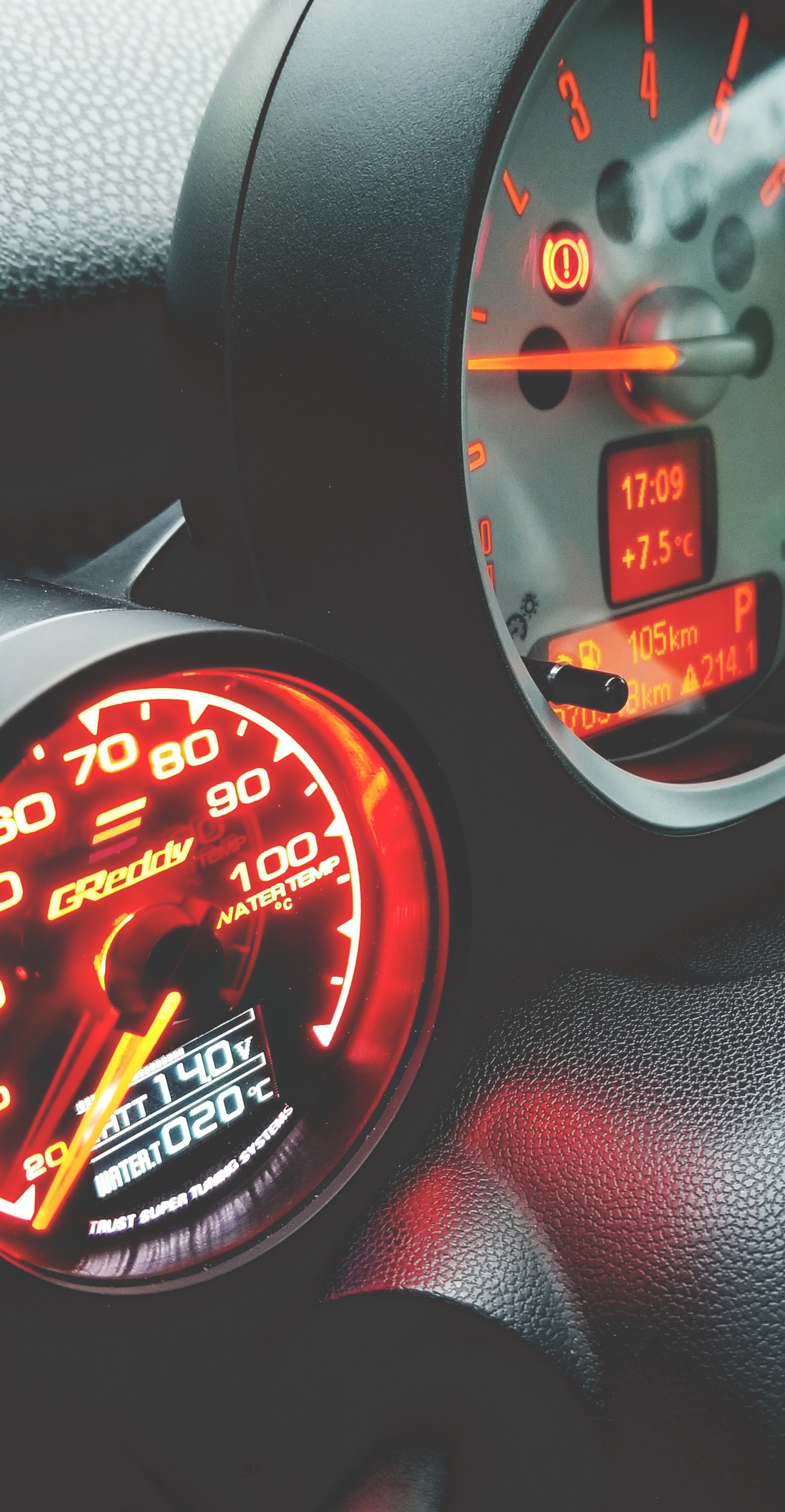 A close up of a car dashboard with a speedometer and a clock (autos, bmw, cars, gauges, gosterge)