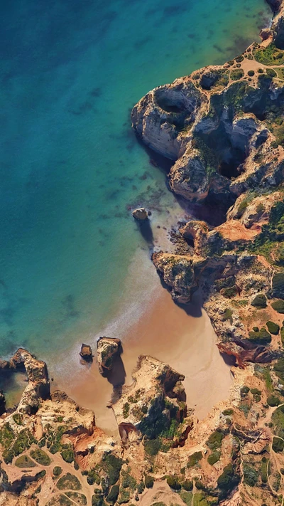 Breathtaking Aerial View of a Serene Beach and Turquoise Sea