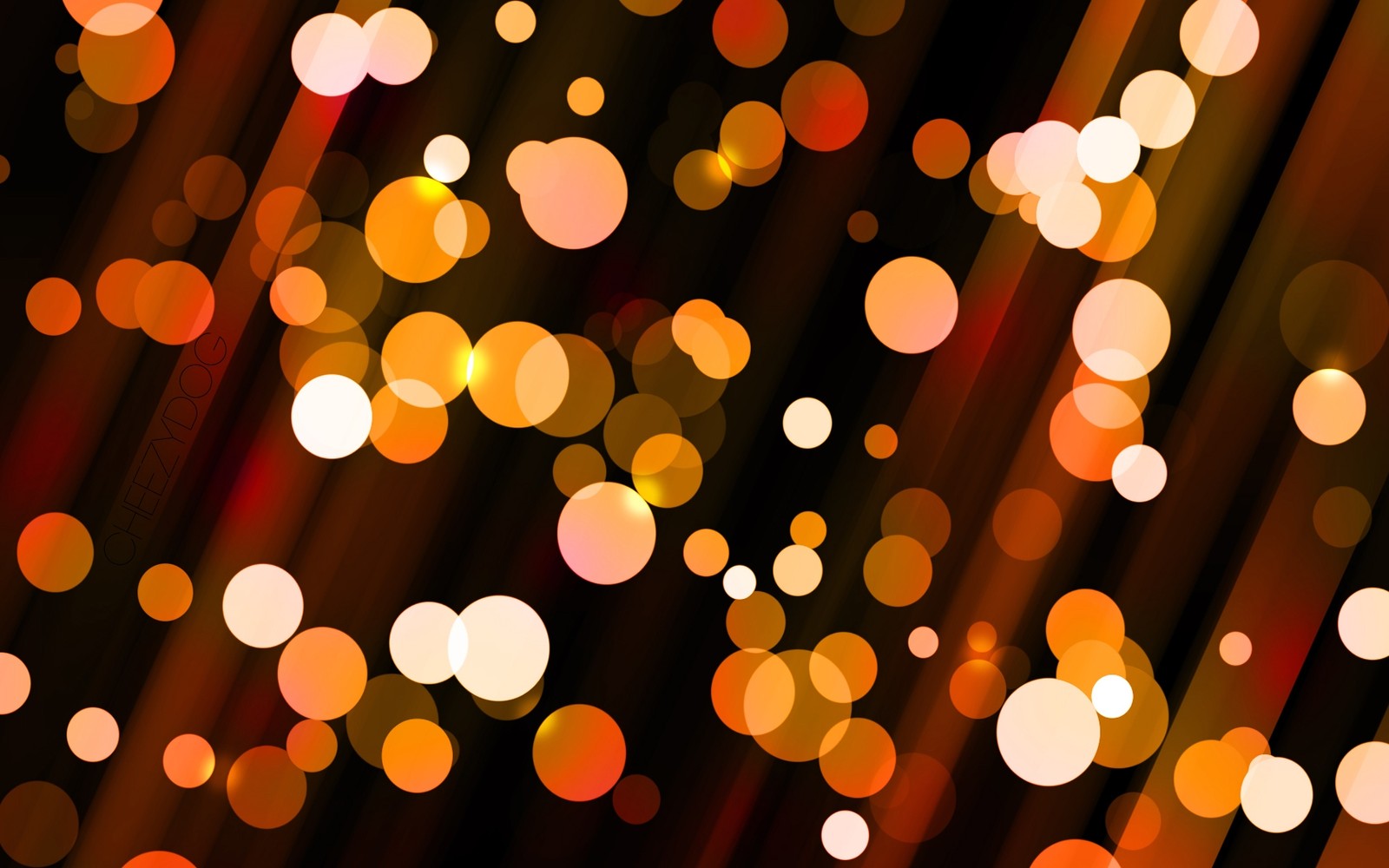 Un gros plan d'un tas de lumières sur un fond noir (bokeh, lumière, orange, éclairage, cercle)