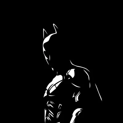 Silhouette of Batman Against a Black Background