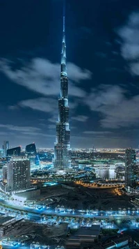 Atemberaubende Nachtansicht des Burj Khalifa, der die Skyline von Dubai erleuchtet