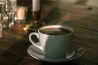 Steaming Cup of Rich Espresso on a Rustic Table