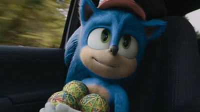 Sonic le Hérisson Tient des Boules Colorées dans une Scène de Voiture du Film de 2020