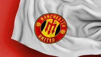 Manchester United-Logo auf strukturiertem Hintergrund