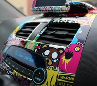 Vibrant Stickerbombed Car Dashboard with Playful Designs