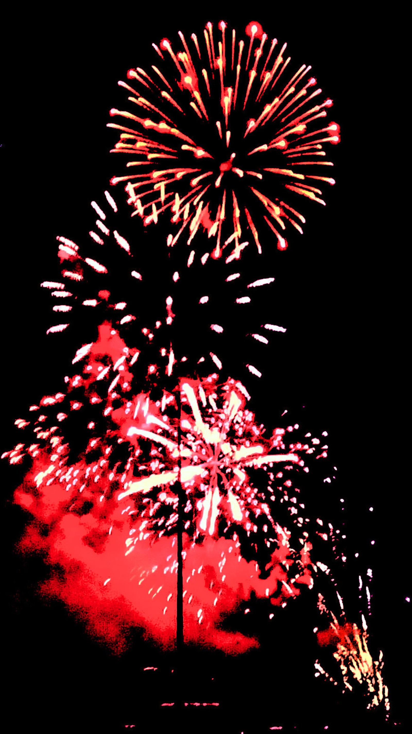 Fireworks in the night sky with a red background (fireworks, red)