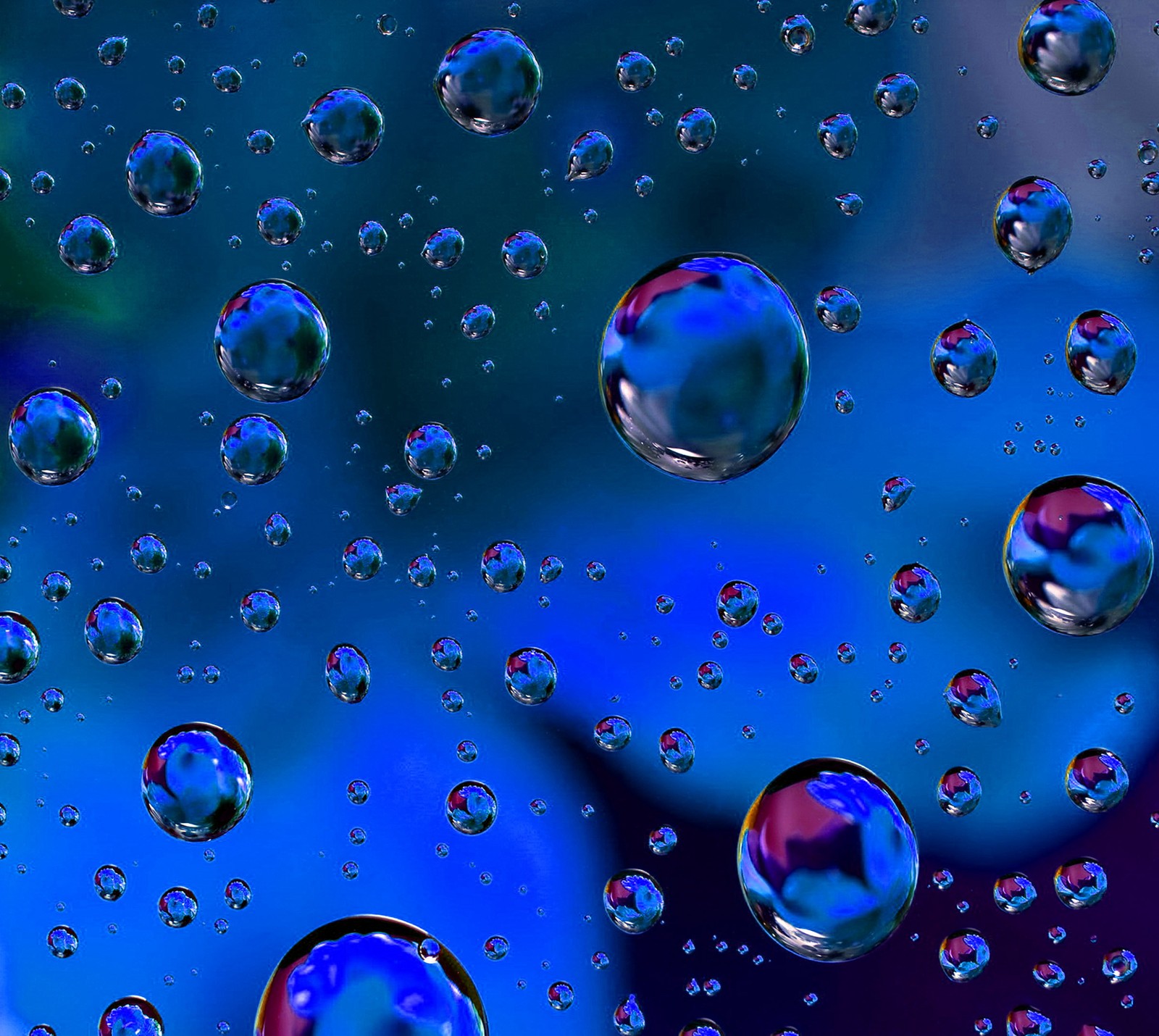 A close up of a bunch of bubbles floating in a blue sky (drop, wallpaper)