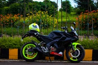 RS200 Motorcycle Against a Vibrant Floral Background