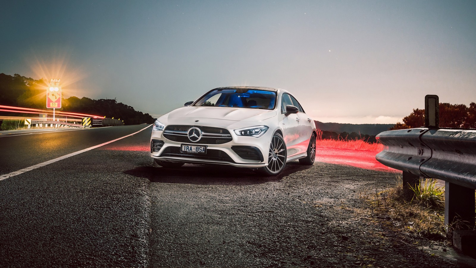 A white mercedes car driving down a road at night (mercedes benz, cars, mercedes amg, volkswagen group, wheel)