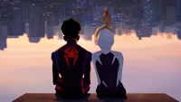 Miles Morales and Spider-Gwen overlooking a city skyline in "Spider-Man: Across the Spider-Verse.