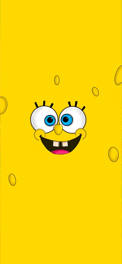 Cheerful SpongeBob Emoticon with a Bright Smile Against a Yellow Background