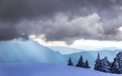 Snowy Mountain Landscape Under Cumulus Clouds