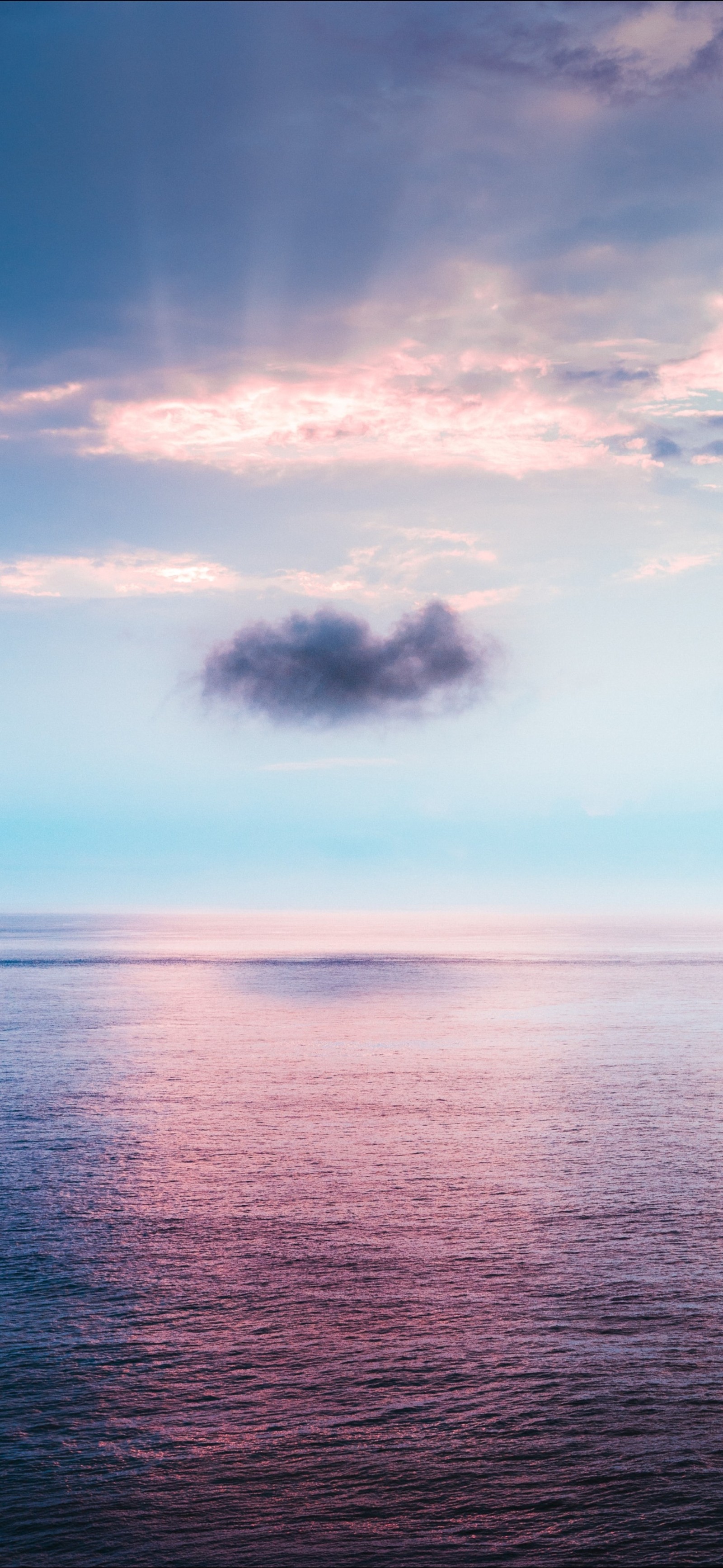 Un nuage solitaire flottant dans le ciel au-dessus de l'océan (océan, mer, nuage, eau, atmosphère)