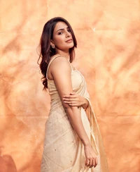 Samantha in Elegant Saree Against Warm Backdrop