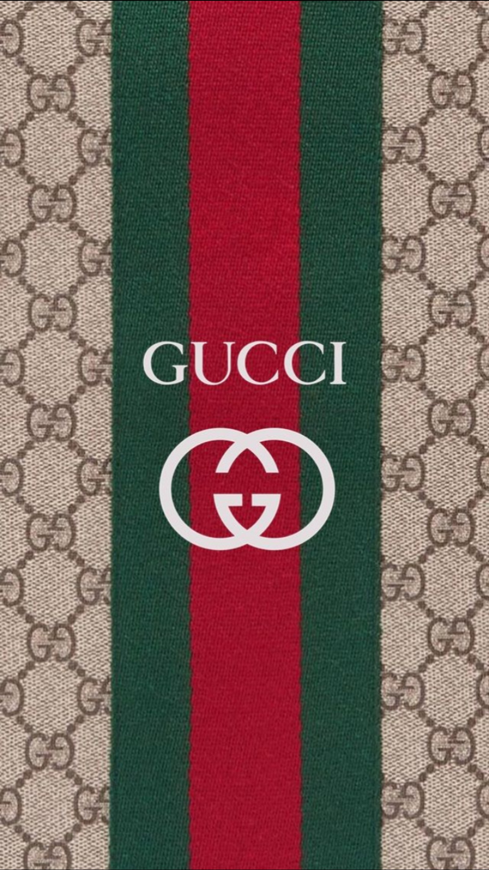 Close-up do logotipo da gucci em uma toalha listrada vermelha e verde (designer, gg, logotipo, monograma, padrão listrado)