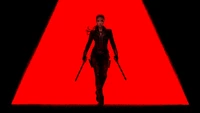 Black Widow: Natasha Romanoff in Action Against a Bold Red Backdrop