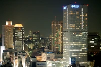 Tokyo Night Skyline: A Vibrant Metropolis Illuminated by Skyscrapers and Tower Blocks