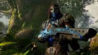 Futuristic Outrider in a Lush Forest Setting with a High-Tech Weapon