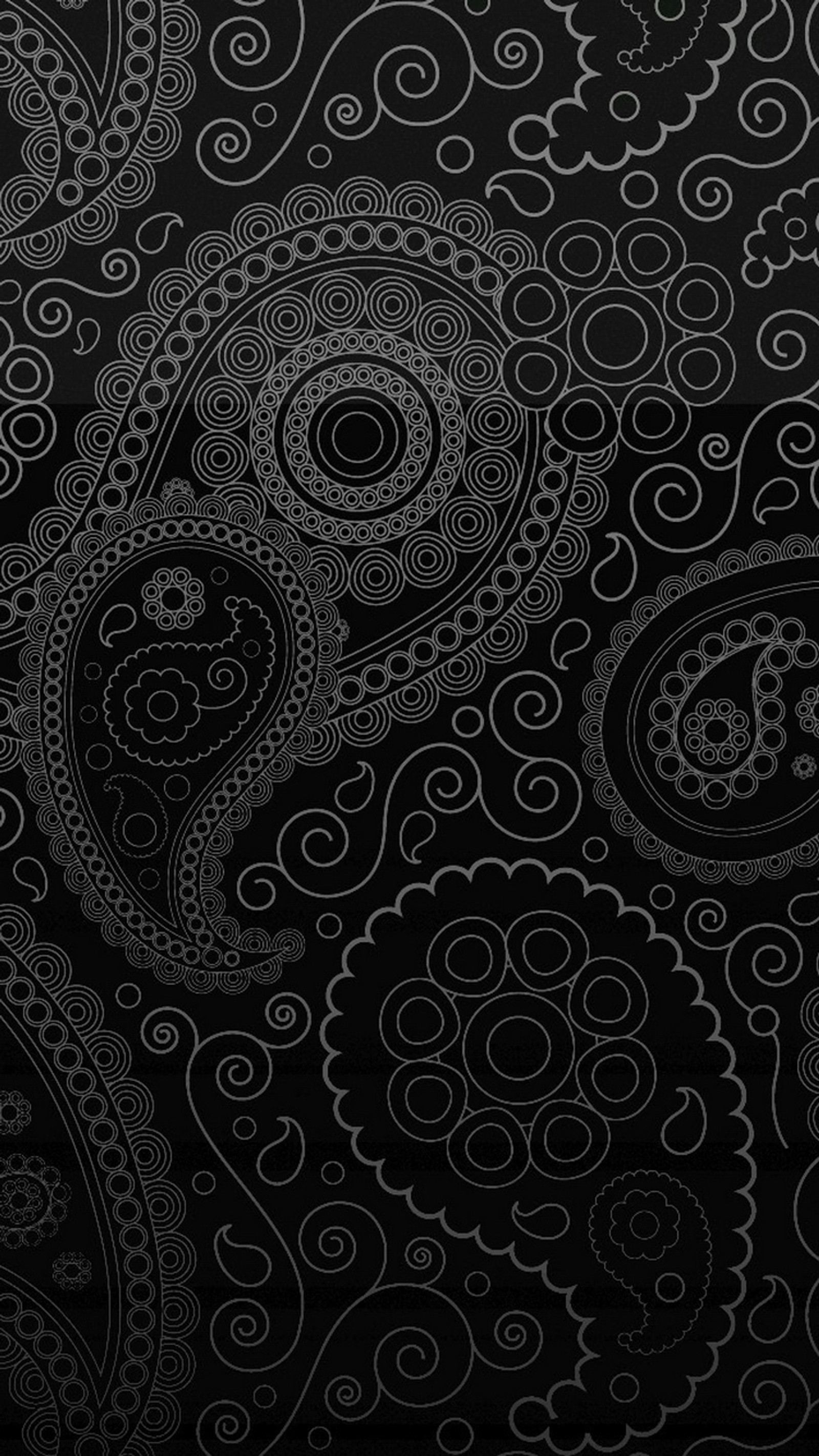 A close up of a black and white paisley pattern on a black background (abstract, beautiful, black, dark, life)