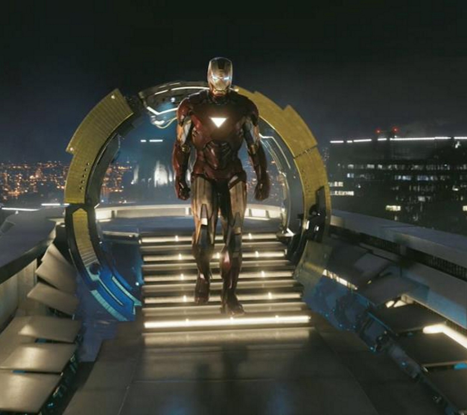 Iron man standing in a tunnel with a city in the background (avengers, iron man)