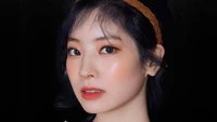 Dahyun de TWICE : Portrait captivant en gros plan.