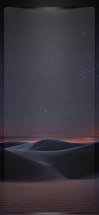 Nuit étoilée sur des dunes roulantes