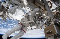 Astronaut Conducting Extravehicular Activity Outside the International Space Station