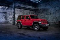 2021 Jeep Wrangler Unlimited Rubicon 1941 in einer rauen industriellen Umgebung