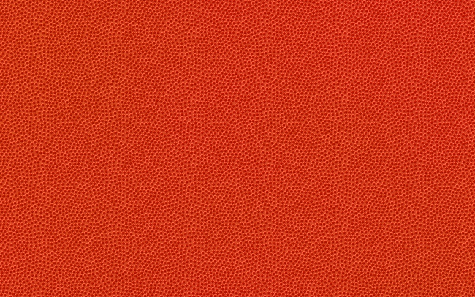 Un gros plan d'une surface en cuir rouge avec un motif (rouge, orange, motif, smartphone, ligne)