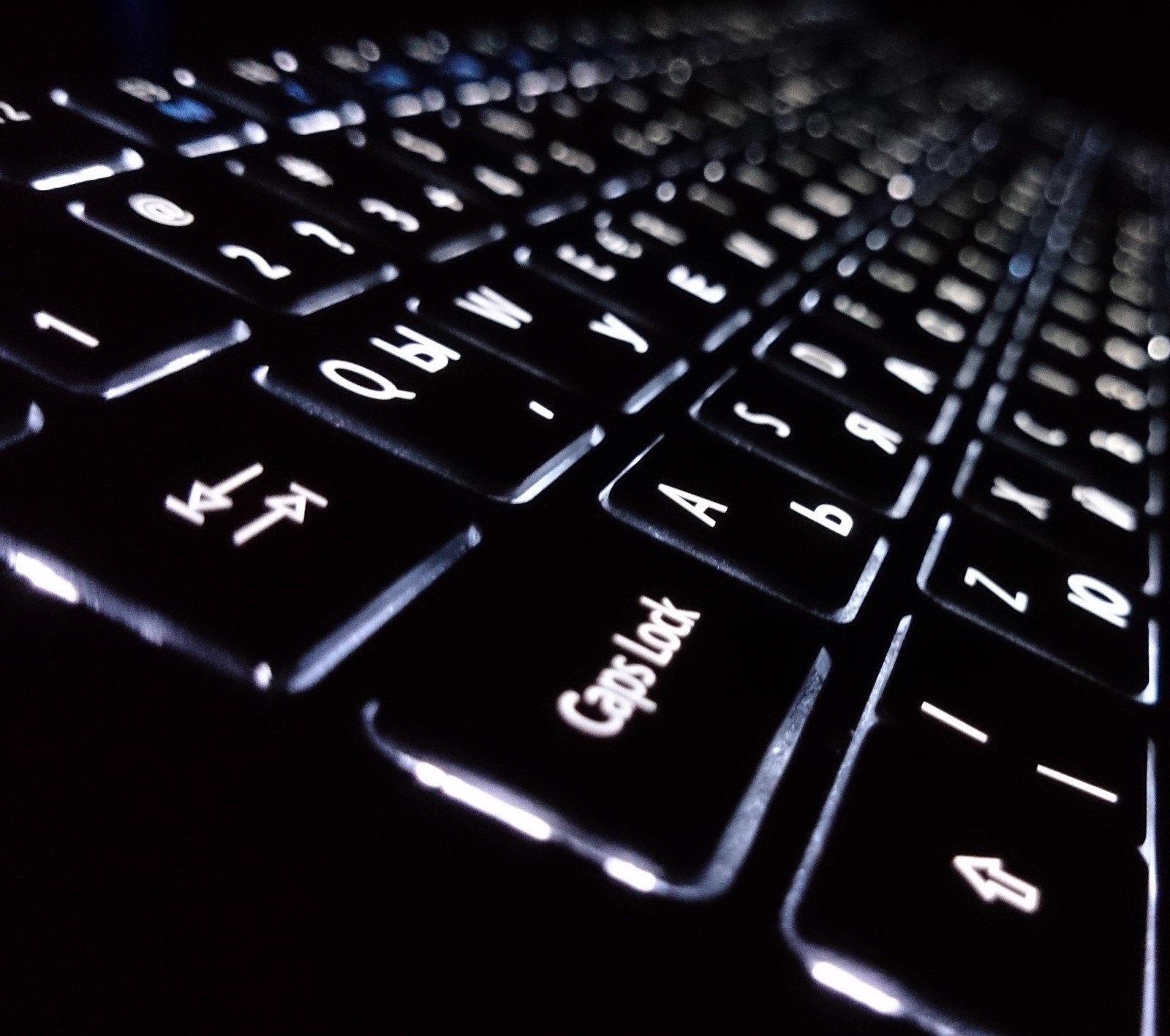 A close up of a black keyboard with a white key (acer, cool, keyboard, light, new)