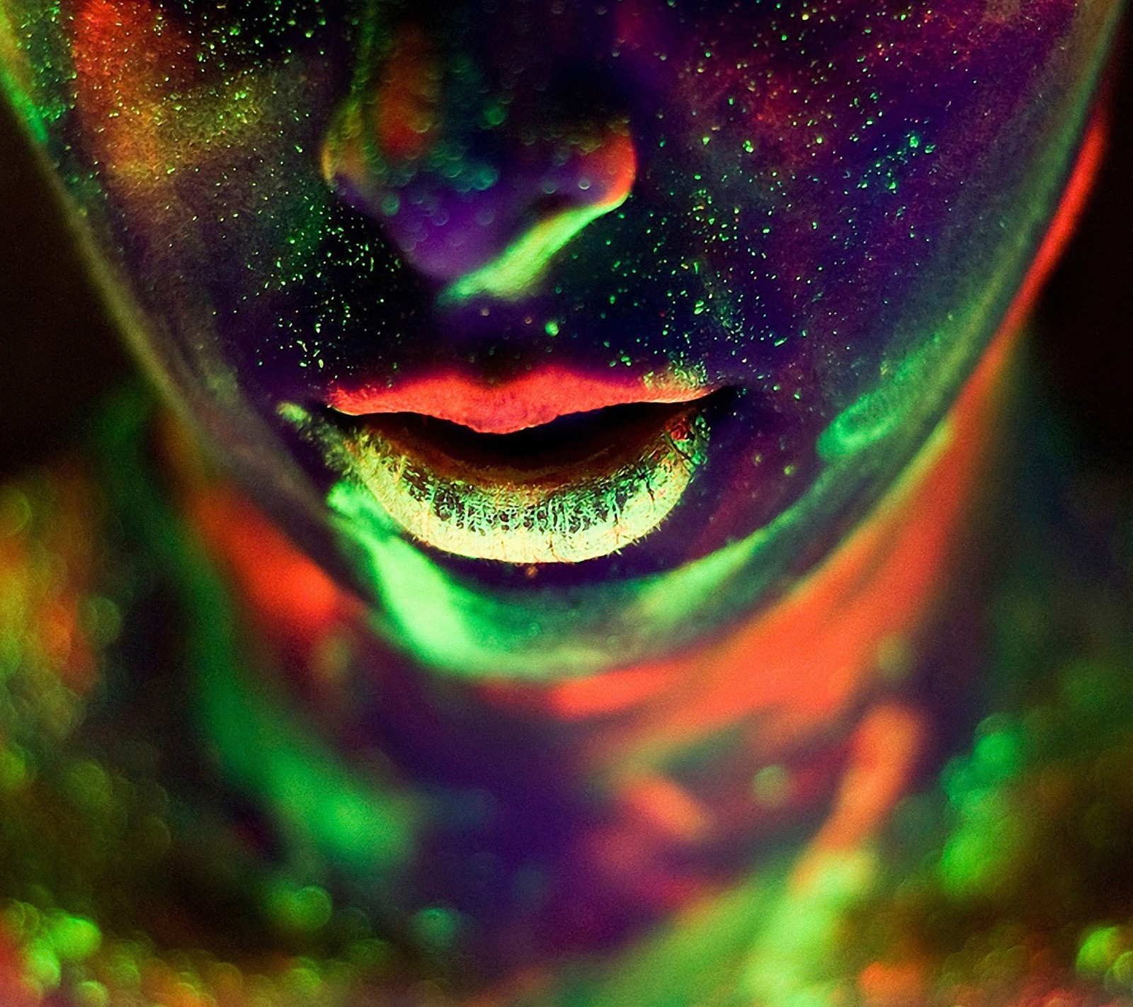 A close up of a person with a glowing face and body (glitter, glow, neon, sparkle)