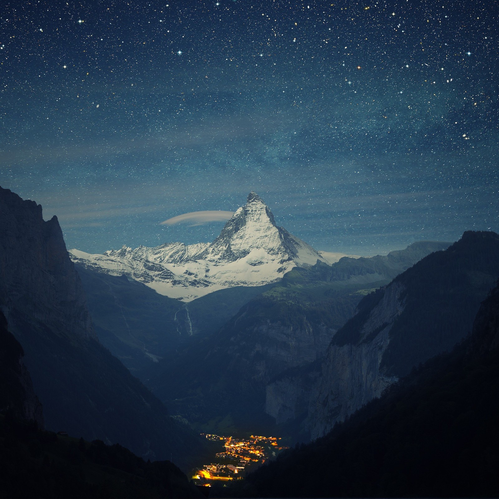 Starry night sky over a mountain range with a town below (mountain, cloud, atmosphere, ecoregion, world)