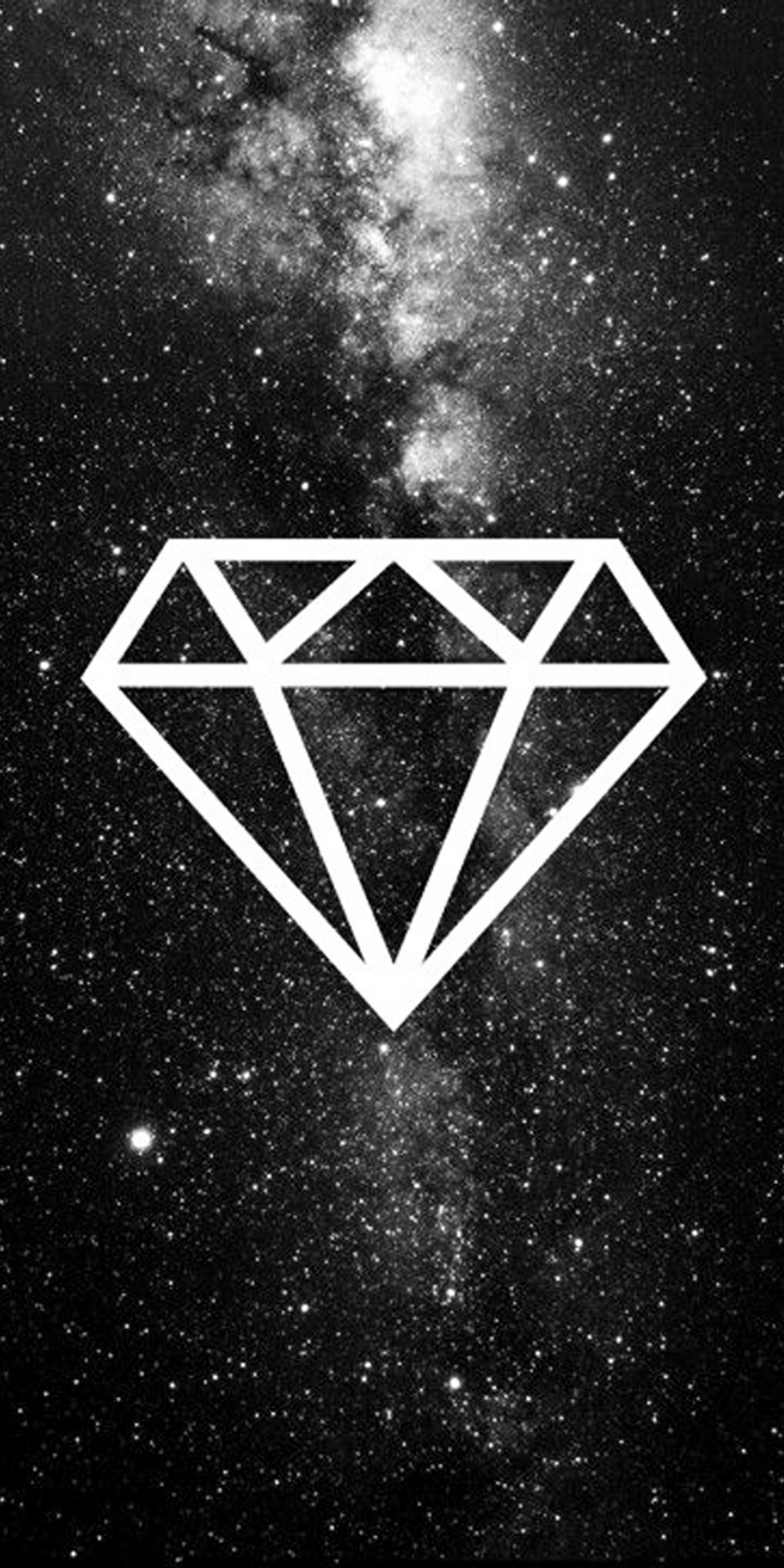 A black and white photo of a diamond in the middle of a galaxy (black, diamond, galaxy, star)